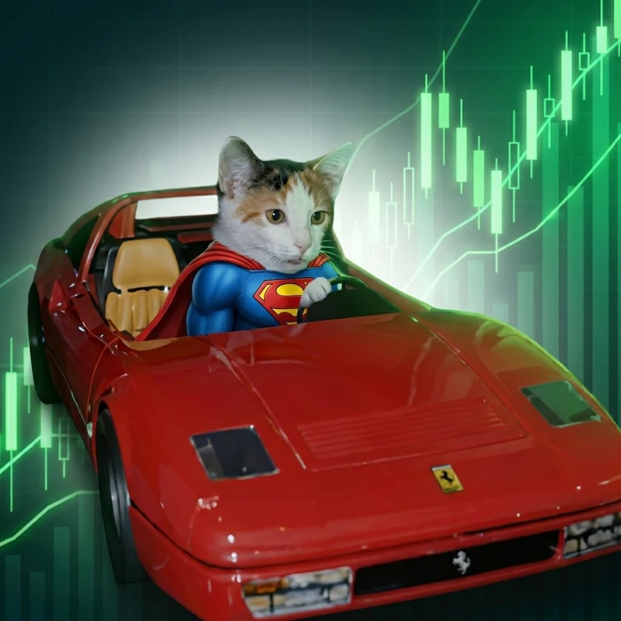 The calico cat in a blue super suit behind the wheel of a red sports car, green price candles rising behind